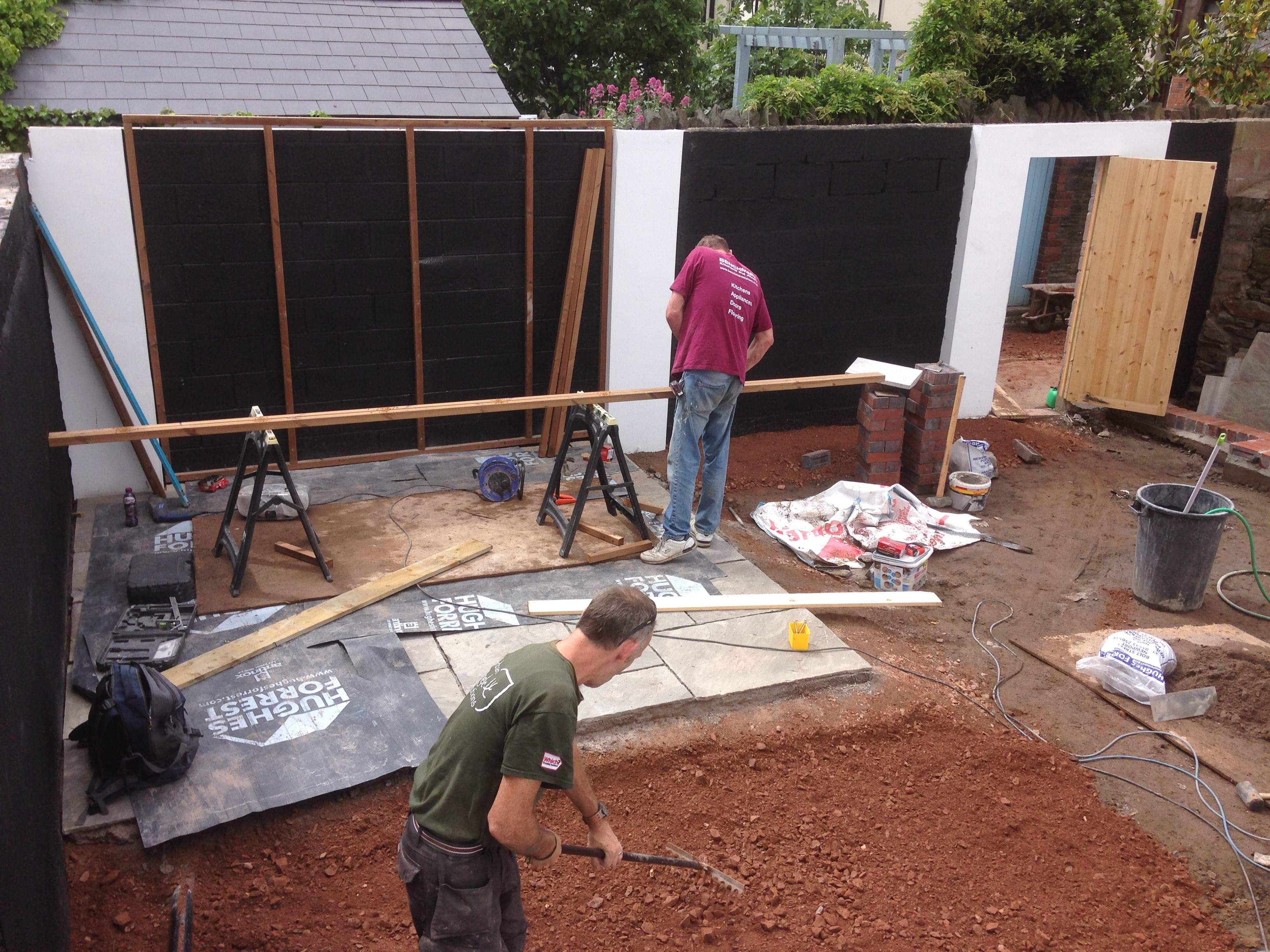 Before: groundworks underway with bare soil and timber at Amesbury Road